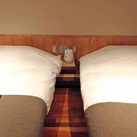 Отель Niseko Konbu Onsen Tsuruga Moku-No-Sho Номер фото