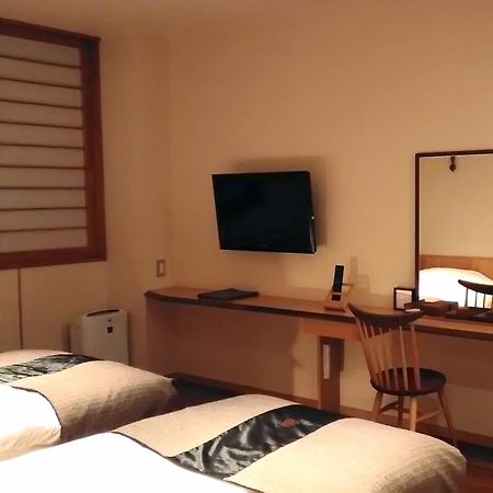 Отель Niseko Konbu Onsen Tsuruga Moku-No-Sho Номер фото