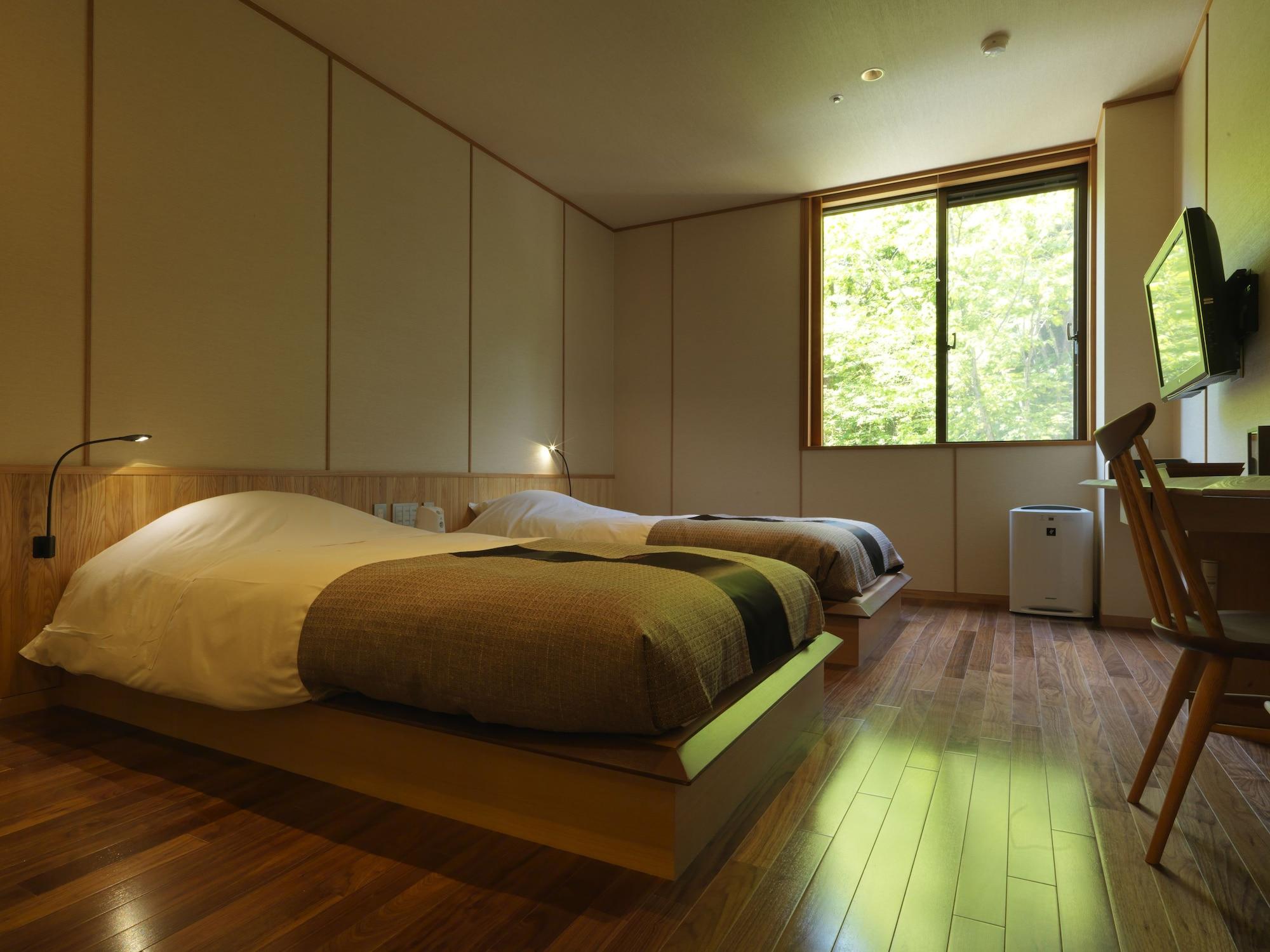 Отель Niseko Konbu Onsen Tsuruga Moku-No-Sho Экстерьер фото