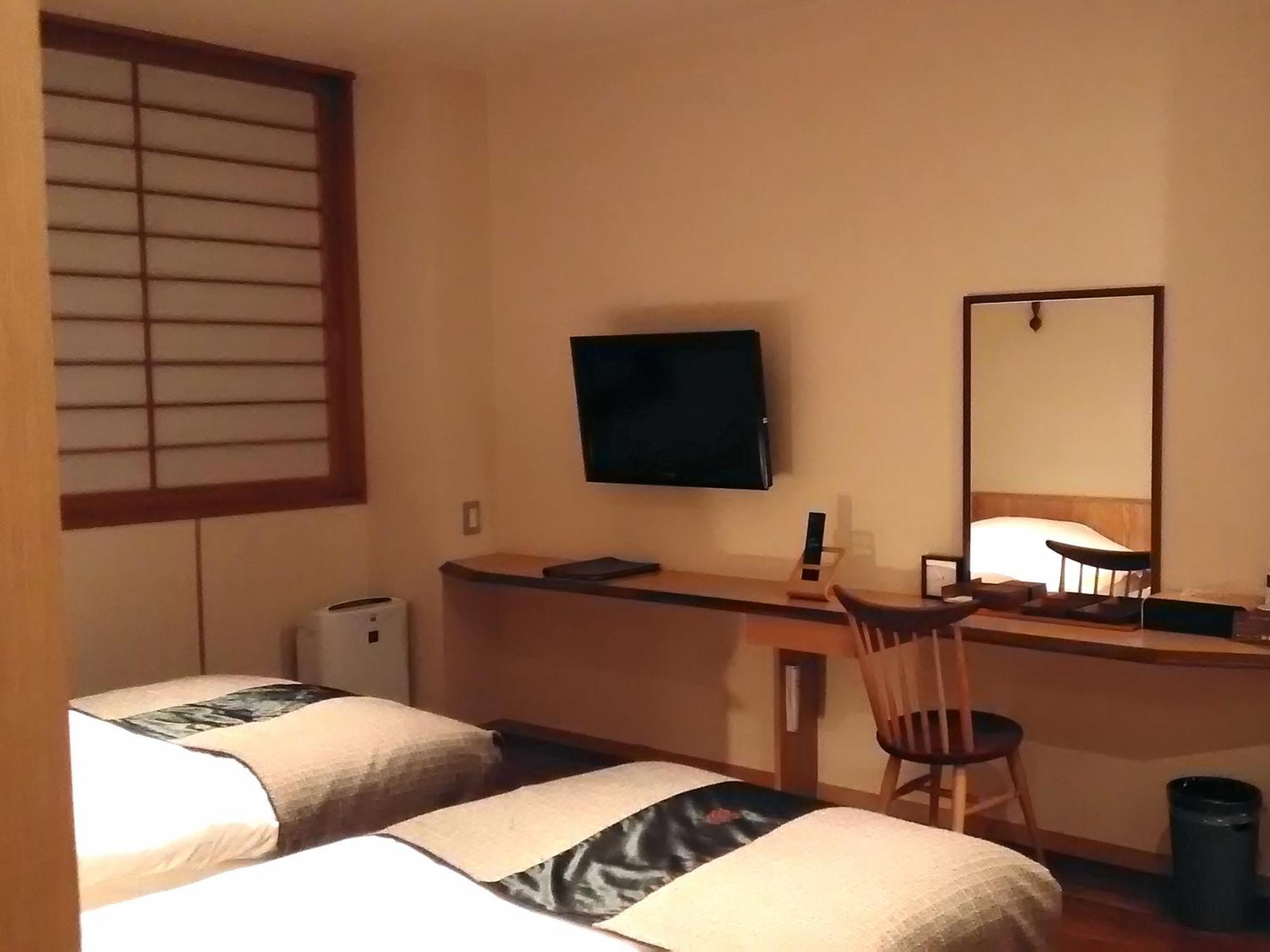 Отель Niseko Konbu Onsen Tsuruga Moku-No-Sho Номер фото