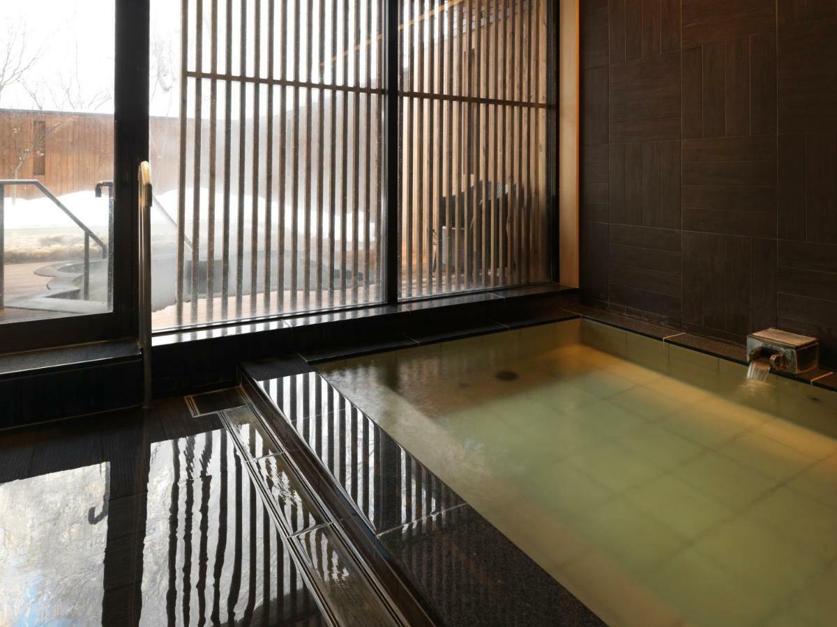Отель Niseko Konbu Onsen Tsuruga Moku-No-Sho Экстерьер фото