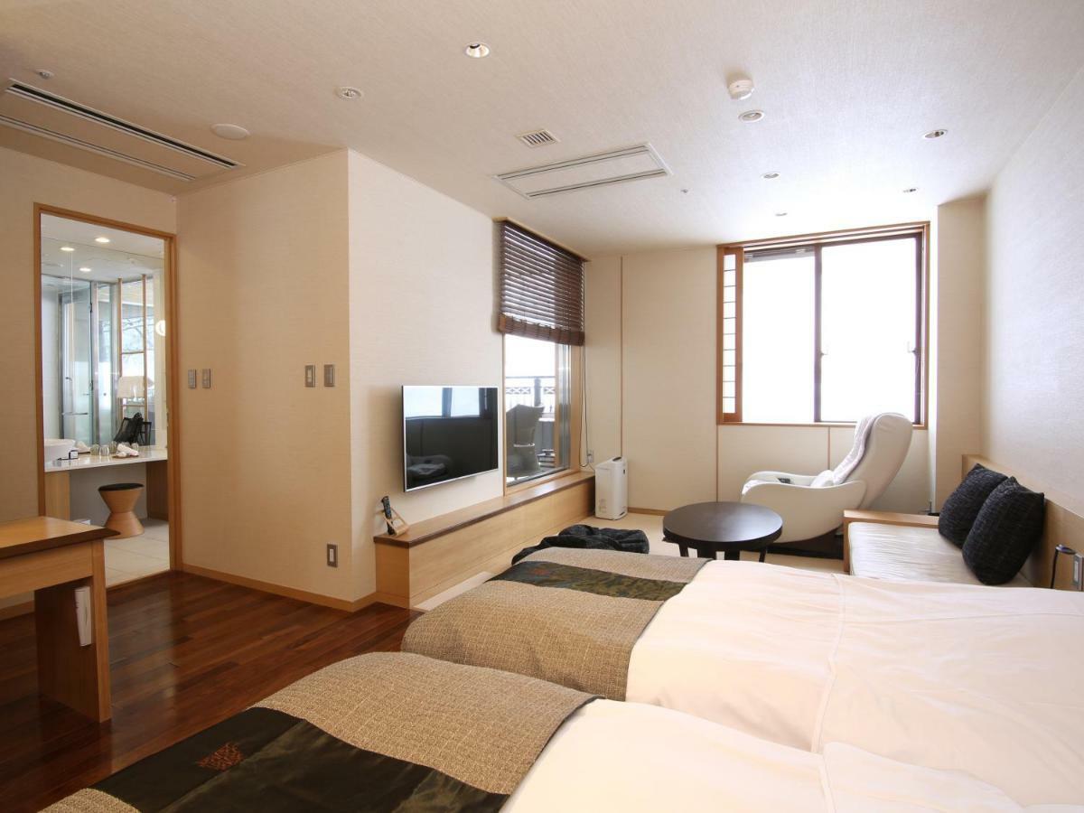 Отель Niseko Konbu Onsen Tsuruga Moku-No-Sho Экстерьер фото