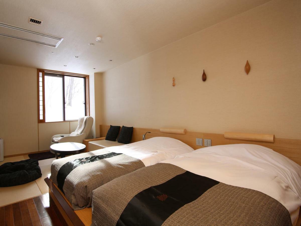 Отель Niseko Konbu Onsen Tsuruga Moku-No-Sho Экстерьер фото