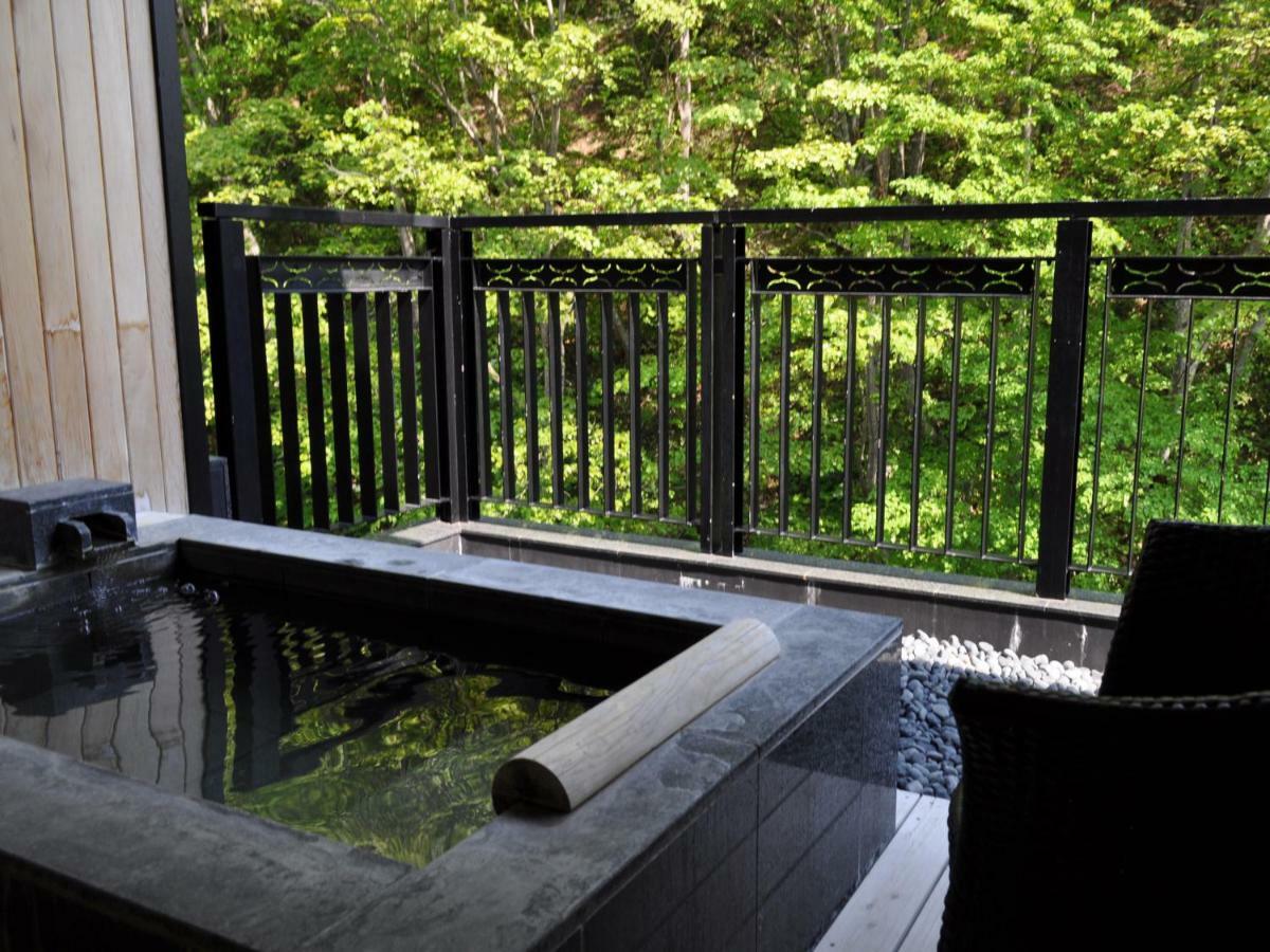 Отель Niseko Konbu Onsen Tsuruga Moku-No-Sho Экстерьер фото